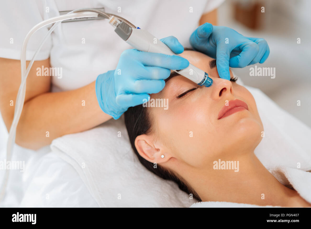 Nice pretty woman lying with her eyes closed Stock Photo - Alamy