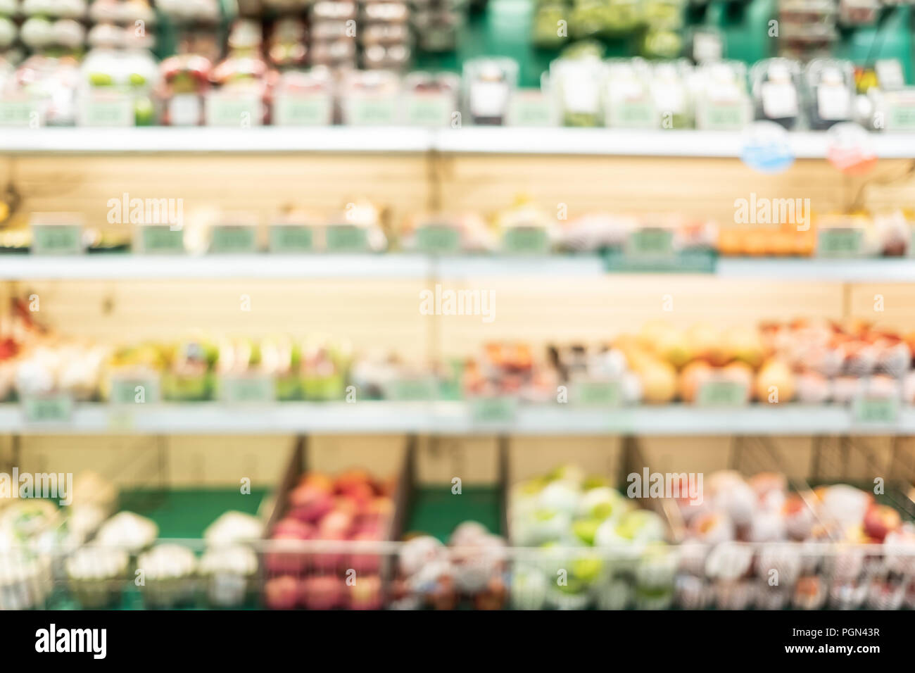 blur background of fresh food in supermarket shelf with bokeh light.grocery product on shelves Stock Photo