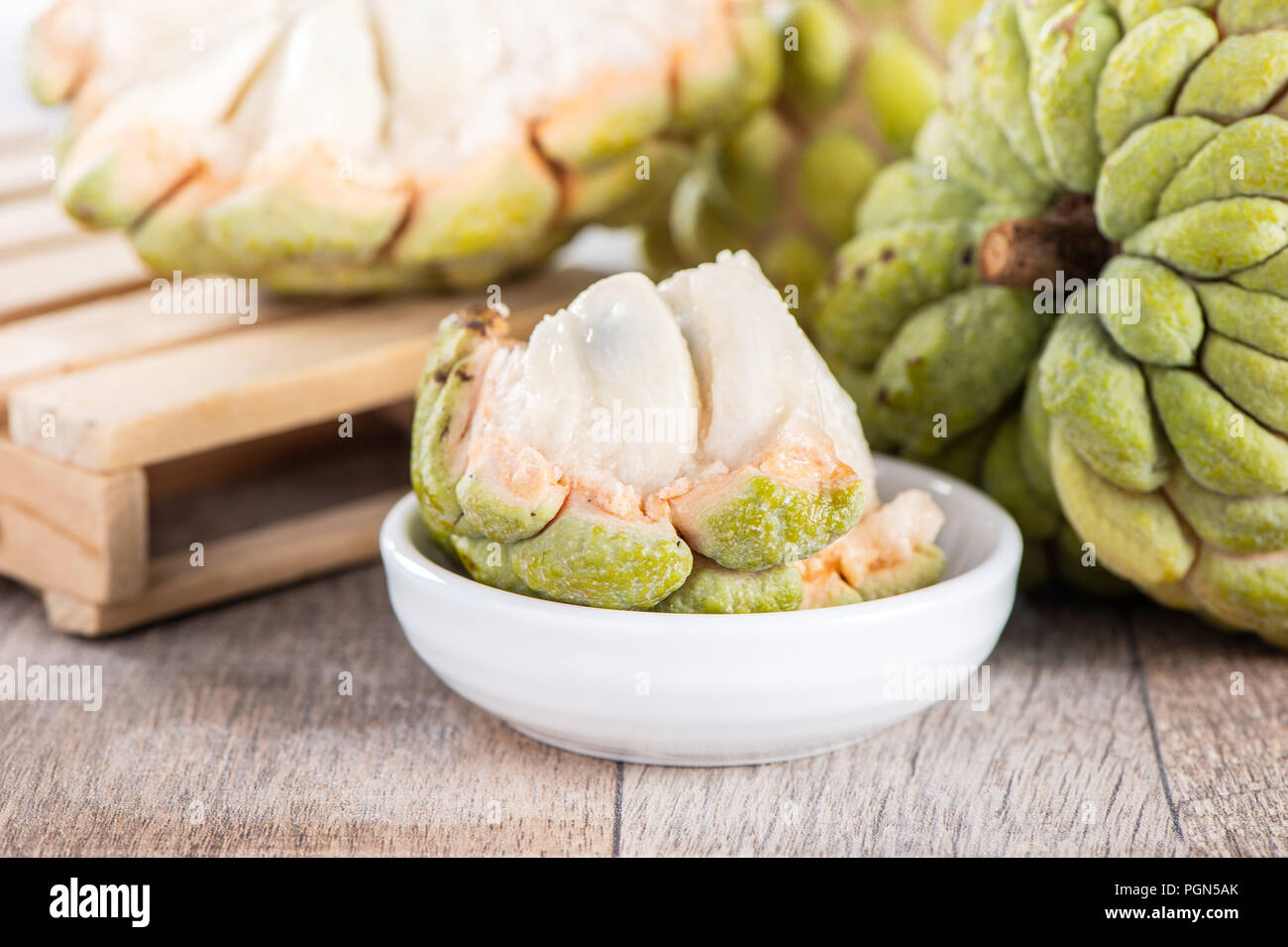 fresh sugar apple fruit(Custard Apple),sweetsop on wooden table ...
