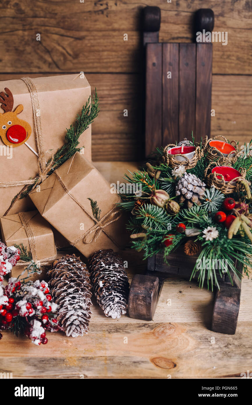 christmas gifts with boxes on wooden background vintage style closeup selective focus toy bear sled christmas concept - Vintage Sled Christmas Decoration christmas gifts with boxes on wooden background vintage style closeup selective focus toy bear sled christmas concept - Vintage Sled Christmas Decoration