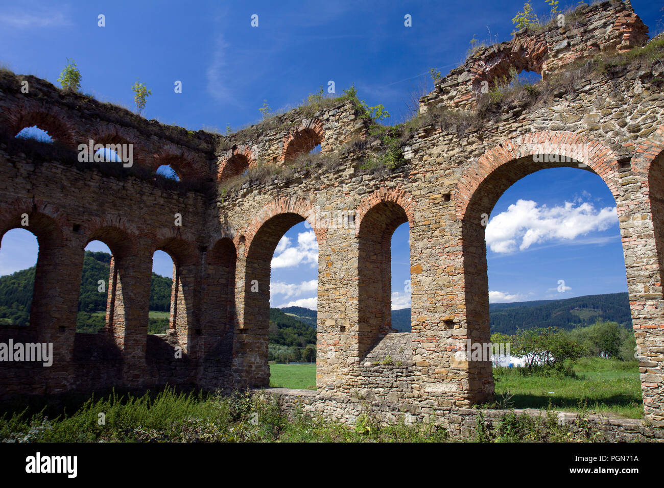 Peripheral walls of the ruined ironworks hall, Orava, Slovakia. Stock Photo