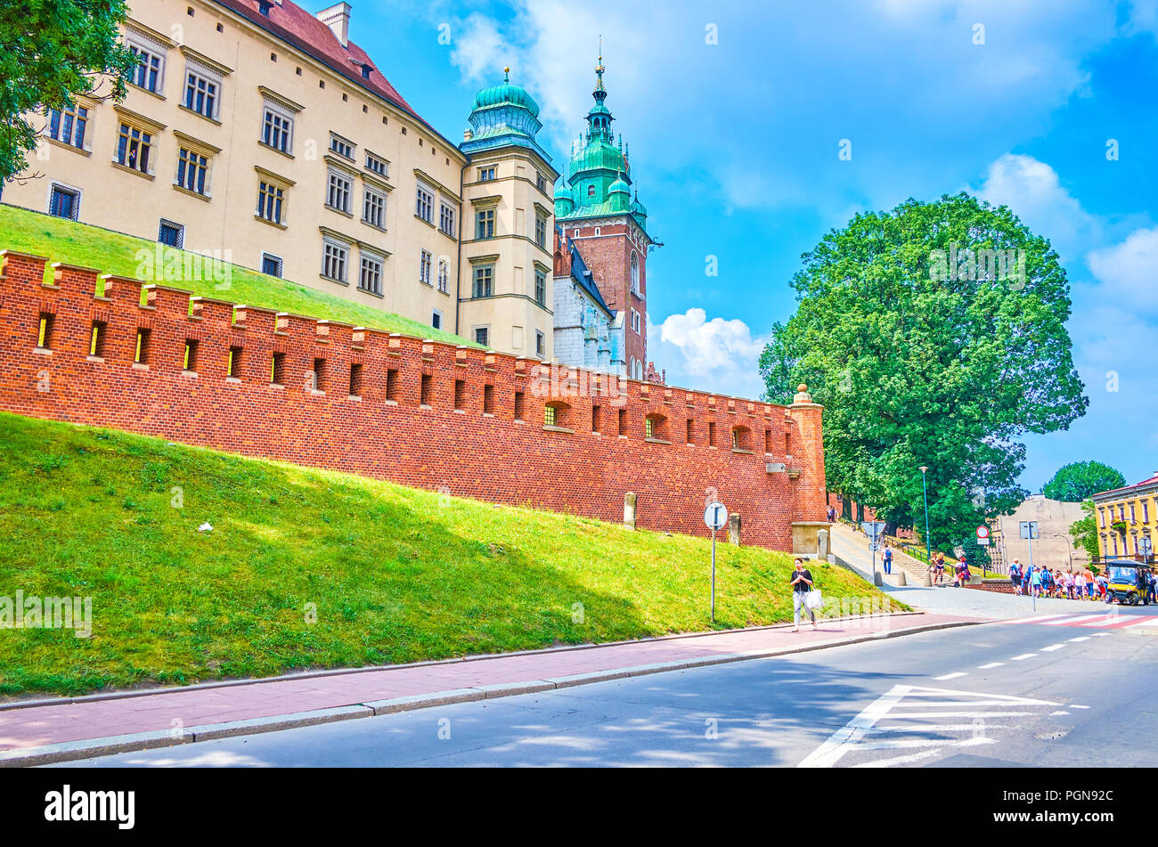 KRAKOW, POLAND - JUNE 11, 2018: The view on beautiful Wawel Castle with its rampart and main staircases inside, on June 11 in Krakow. Stock Photo