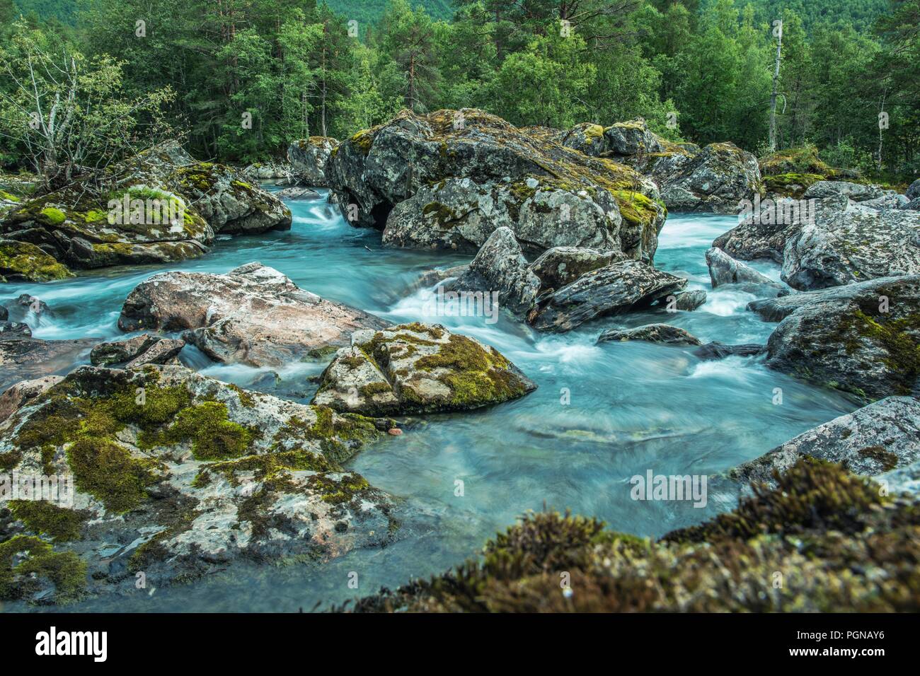 Scenic Glacial Rocky River. Western Norwegian Raw Landscape. Summer Scenery Stock Photo