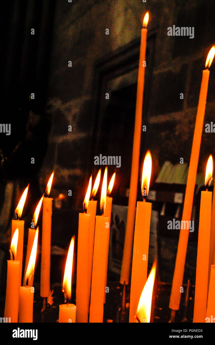 Candles keeping memories alive inside the Cathedral notre-dame de reims, in Reims, France Stock Photo