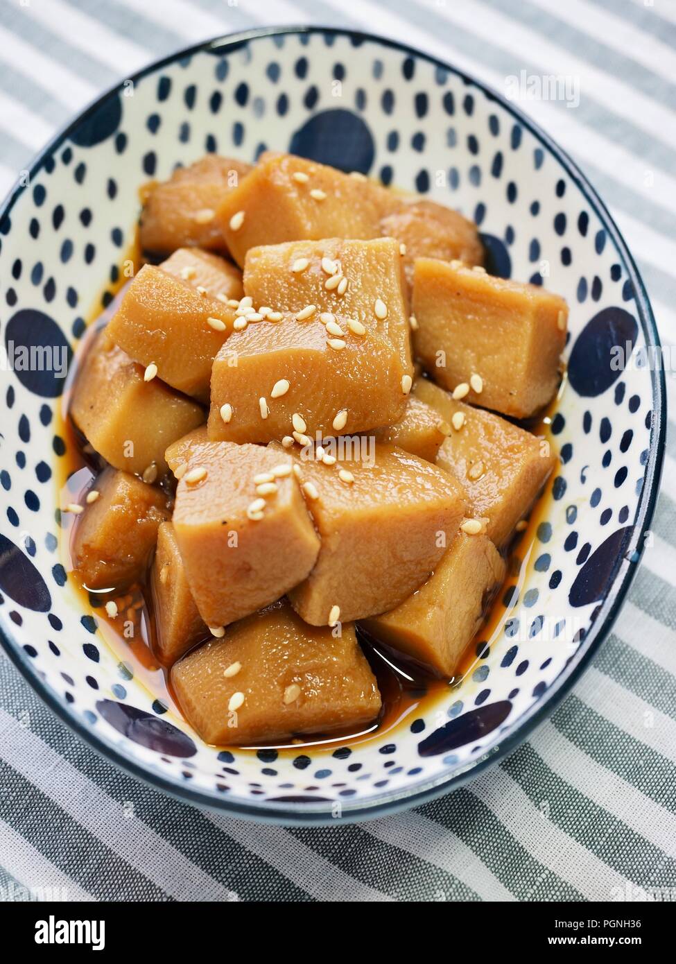 Asian food Stewed potatoes with soy sauce Stock Photo