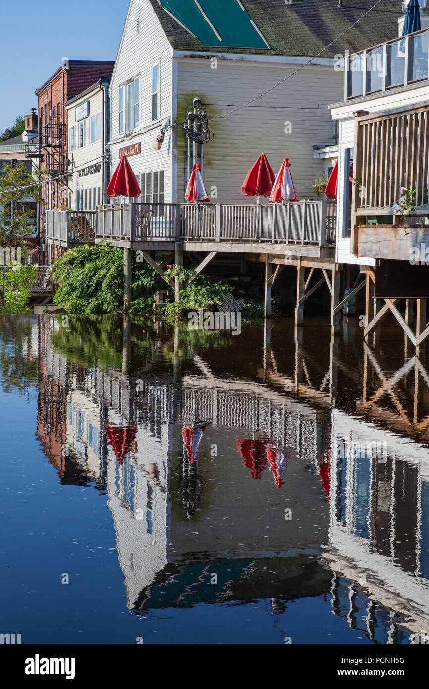 Reflections of the rear of buildings that are along the Main Street in
