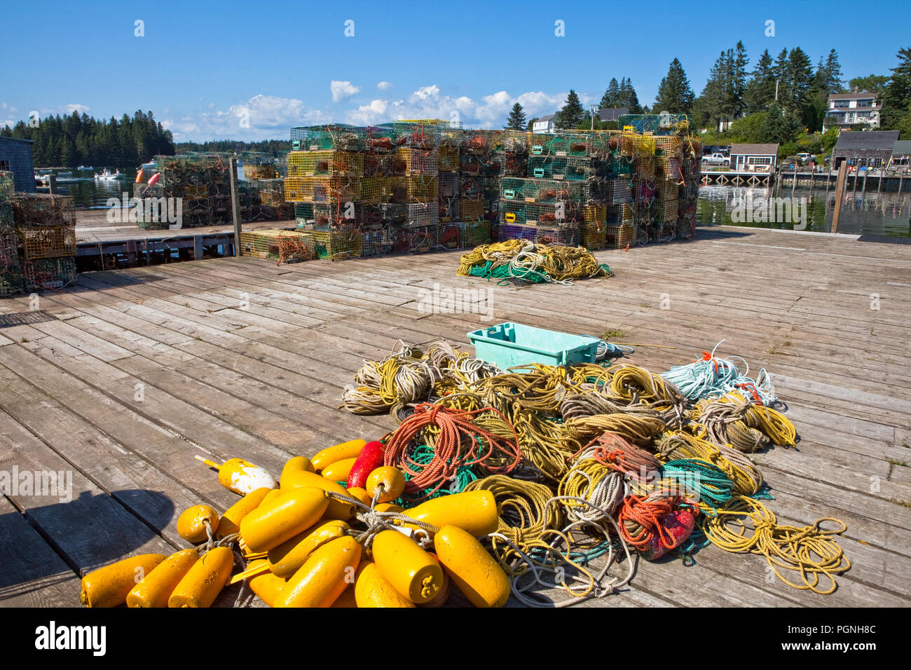 Lobster traps and buoys on the dock in Port Clyde, Maine Stock Photo