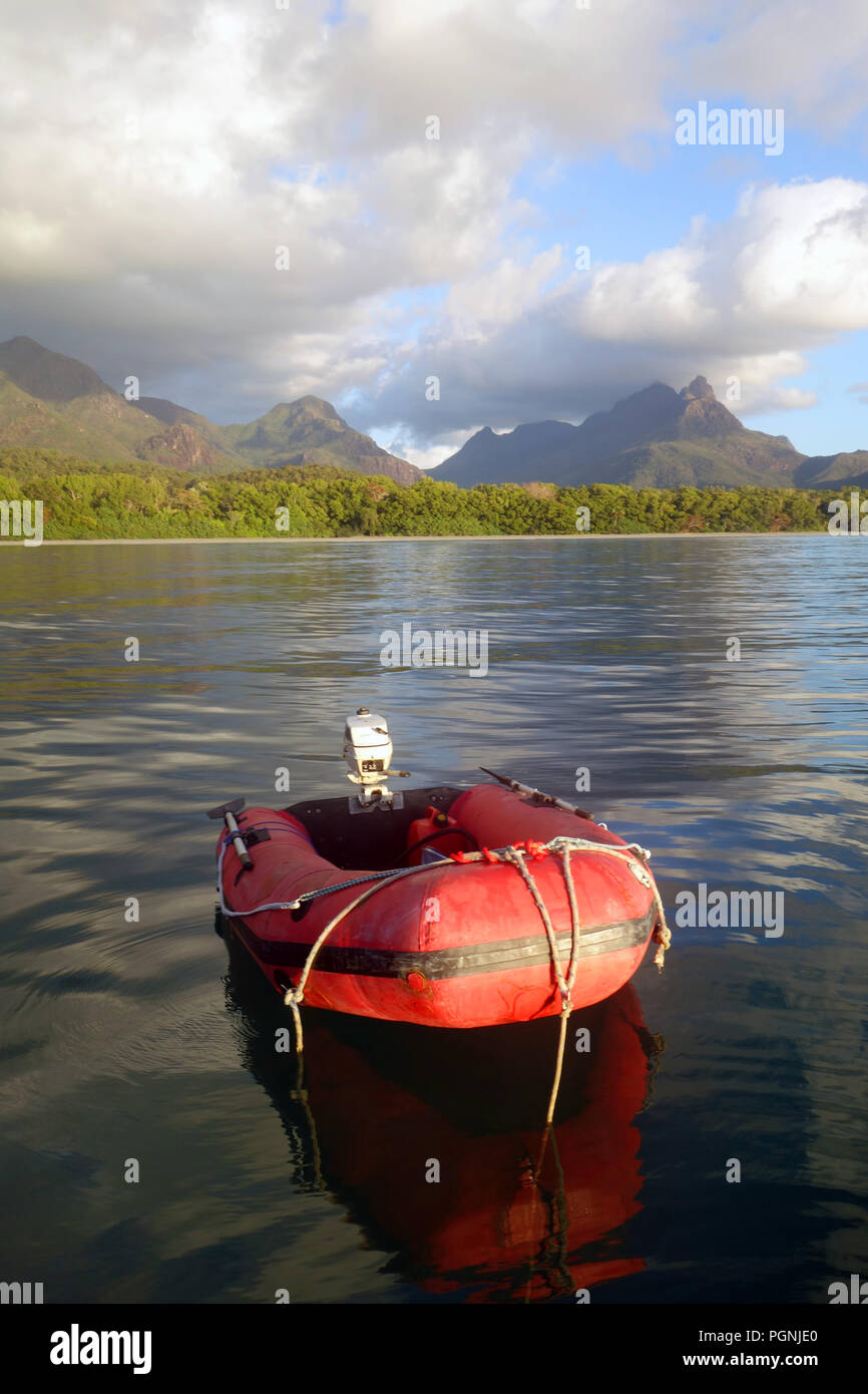 Red inflatable boat in Zoe Bay, Hinchinbrook Island National Park, Queensland, Australia. No PR Stock Photo