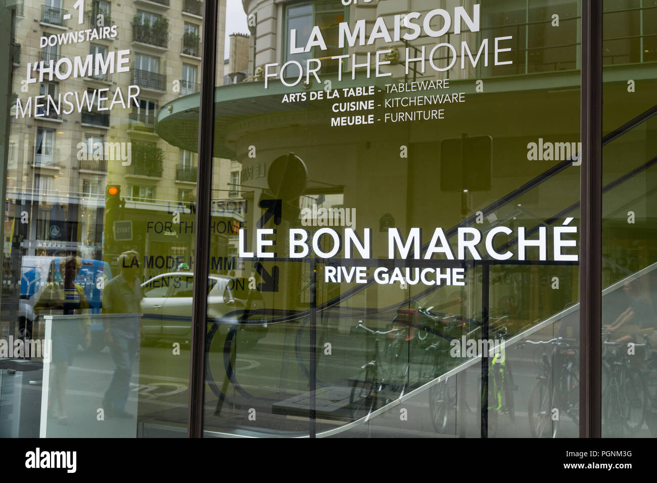 Window of Le Bon Marche department store in Paris, France Stock Photo ...