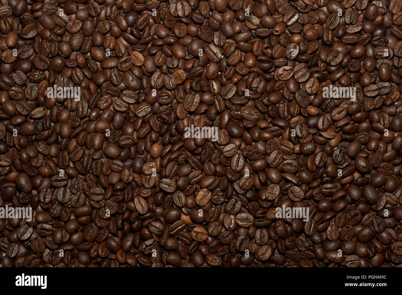 Roasted Coffee Beans Filling the whole Frame Stock Photo - Alamy