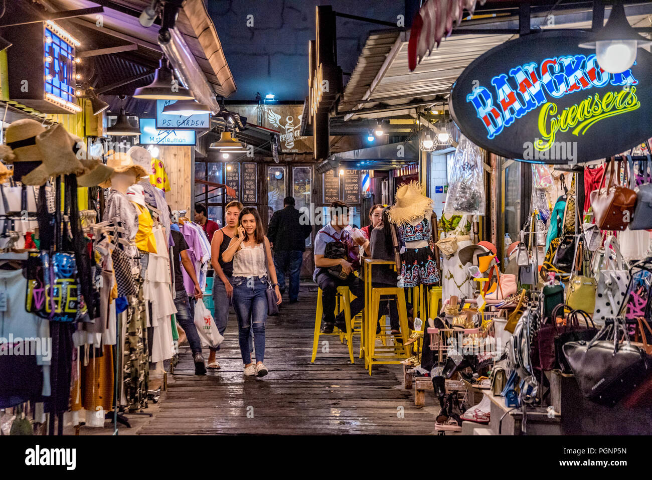 BANGKOK, THAILAND - JULY 12: Night scene of Vintage clothes shops and stalls in the famous Rod Fai night market on July 12, 2018 in Bangkok Stock Photo