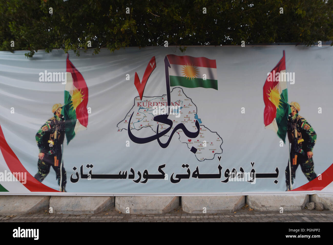 September 27, 2017 - Erbil, Kurdistan: A banner in the streets of Erbil shows a map of the territories claimed by Kurdistan as its own, including parts of Syria, Turkey, Iraq, and Iran. The Iraqi Kurdish electoral commission declared that more than 92 percent of voters backed independence from Iraq in a historic referendum. Ambiance dans les rues d'Erbil apres le referendum sur l'independance du Kurdistan irakien. *** FRANCE OUT / NO SALES TO FRENCH MEDIA *** Stock Photo