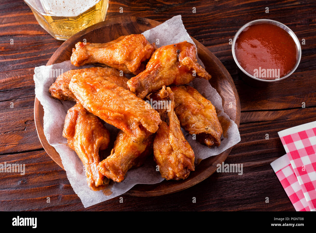 A serving of delicious spicy buffalo chicken wings on a restaurant table  top Stock Photo - Alamy