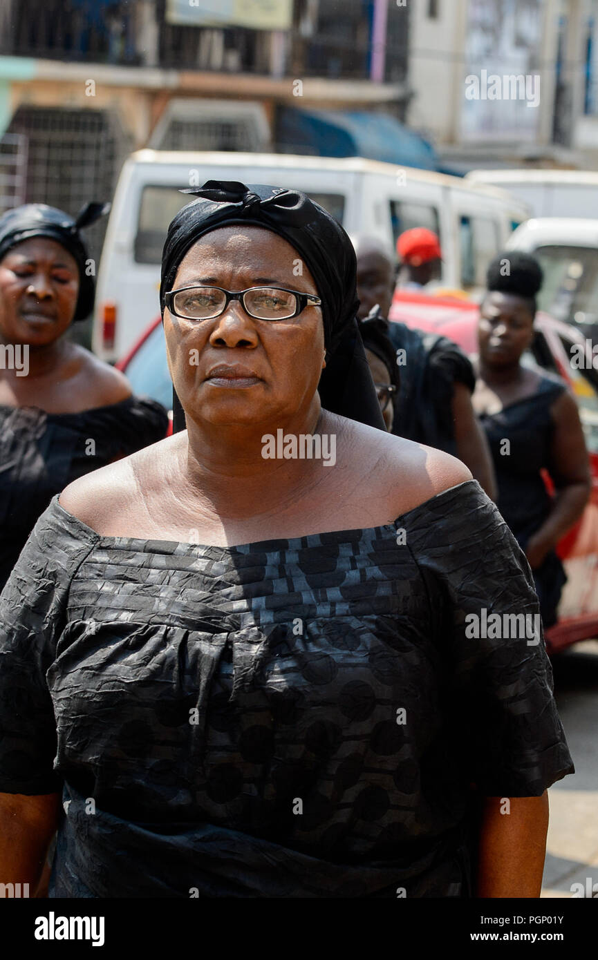 KUMASI, GHANA JAN 15, 2017 Unidentified Ghanaian woman in black