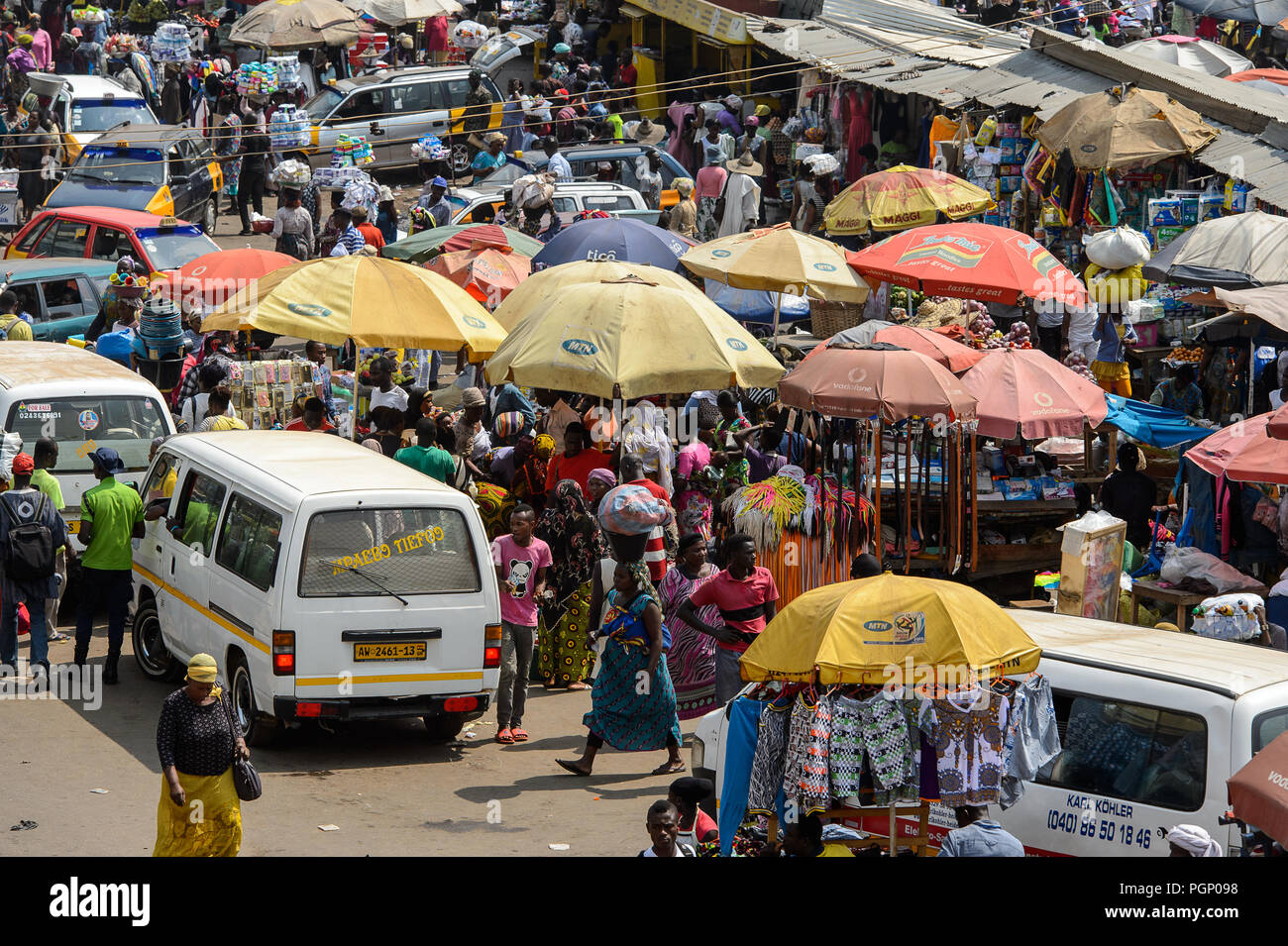 KUMASI, GHANA - JAN 15, 2017: Unidentified Ghanaian people walk at the ...