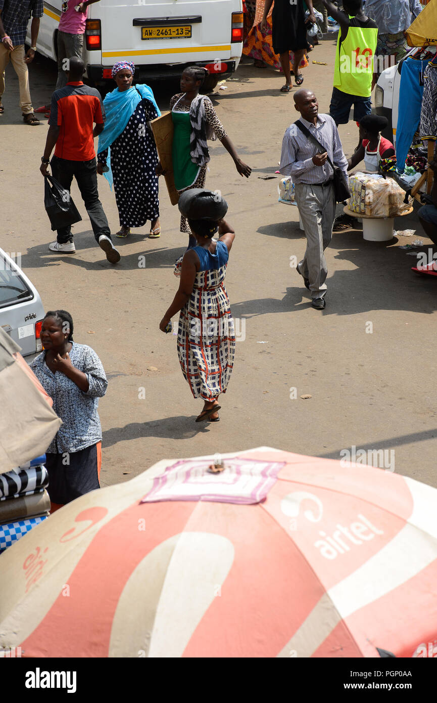 KUMASI, GHANA JAN 15, 2017 Unidentified Ghanaian people walk at the