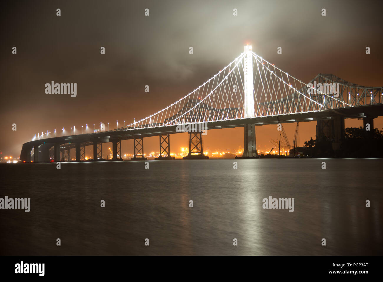 View of the Bay Bridge lit up at night, San Francisco, North Beach, California, USA Stock Photo