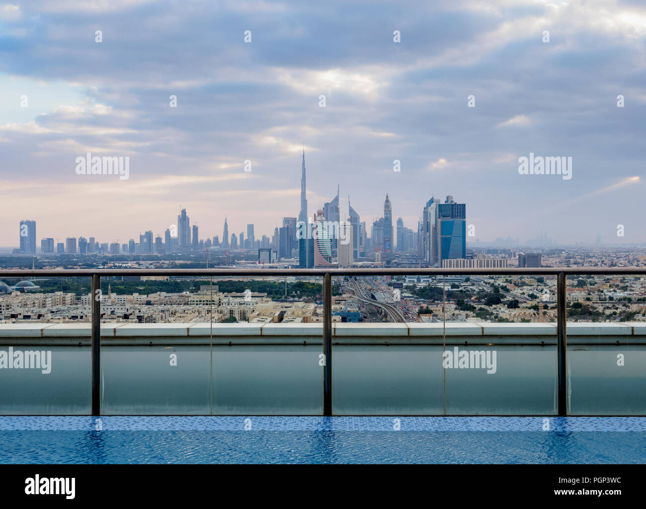 Rooftop swimming pool with city skyline, Dubai, United Arab Emirates Stock Photo Alamy