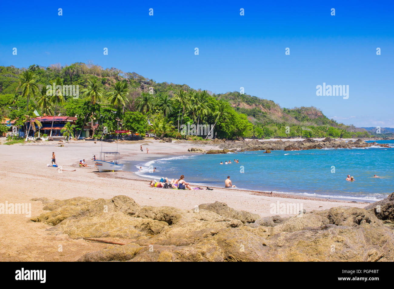 Playa Motezuma Costa Rica June 28 2018 Unidentified People Swimming And Enjoying The Beautiful Blue Water Of The Beach In Playa Montezuma In Cost Stock Photo Alamy