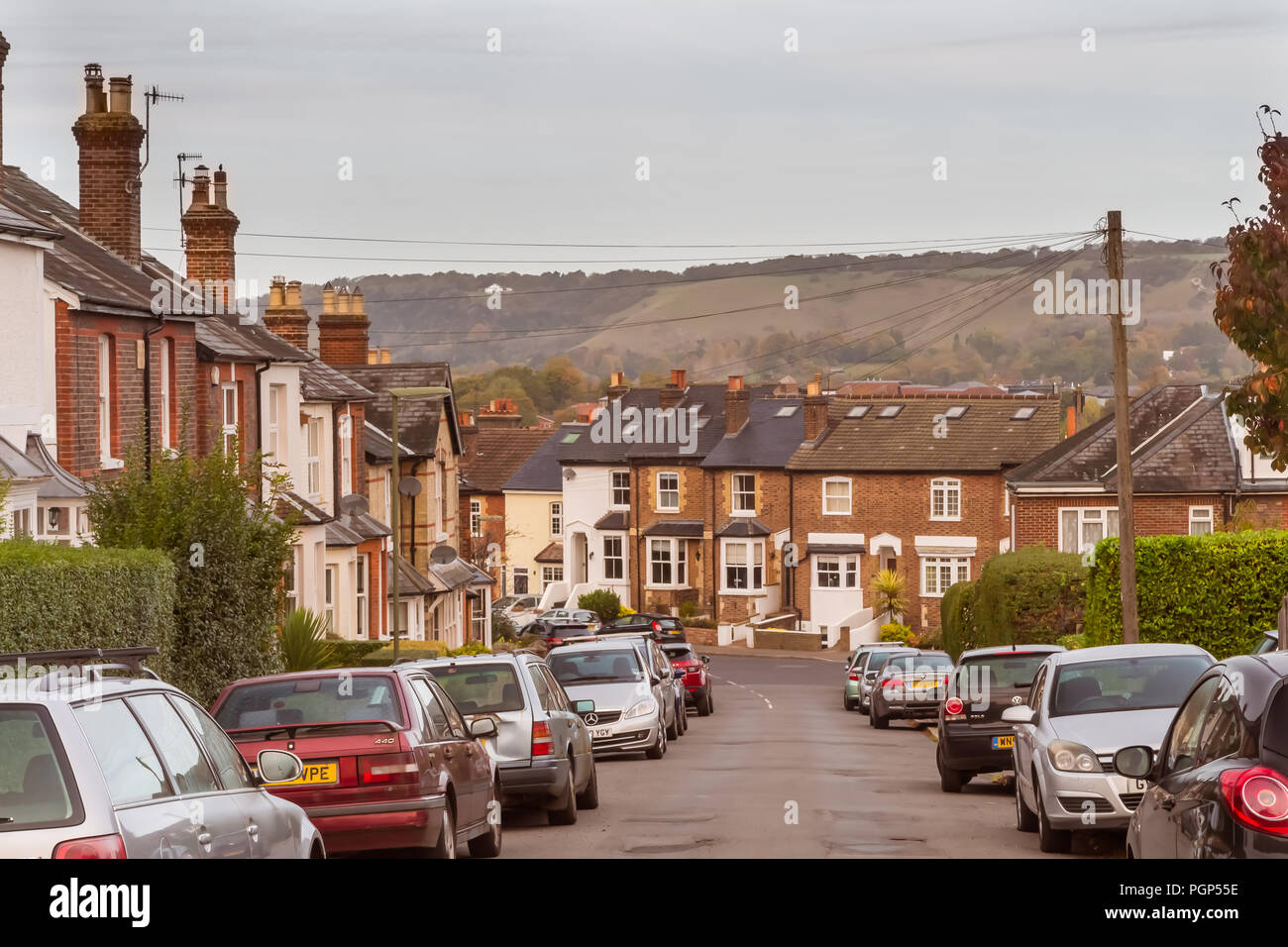 October 2017 - typical English view of terraced houses in Reigate, Surrey, UK, with North Downs hills seen in the background Stock Photo