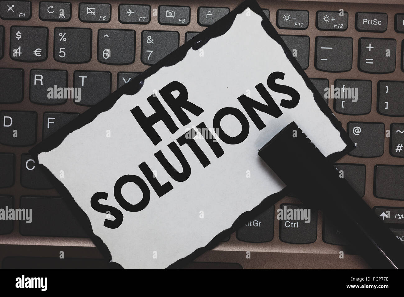 Handwriting text Hr Solutions. Concept meaning Outsourced Human resources consultancy and support Experts White paper keyboard Inspiration communicate Stock Photo
