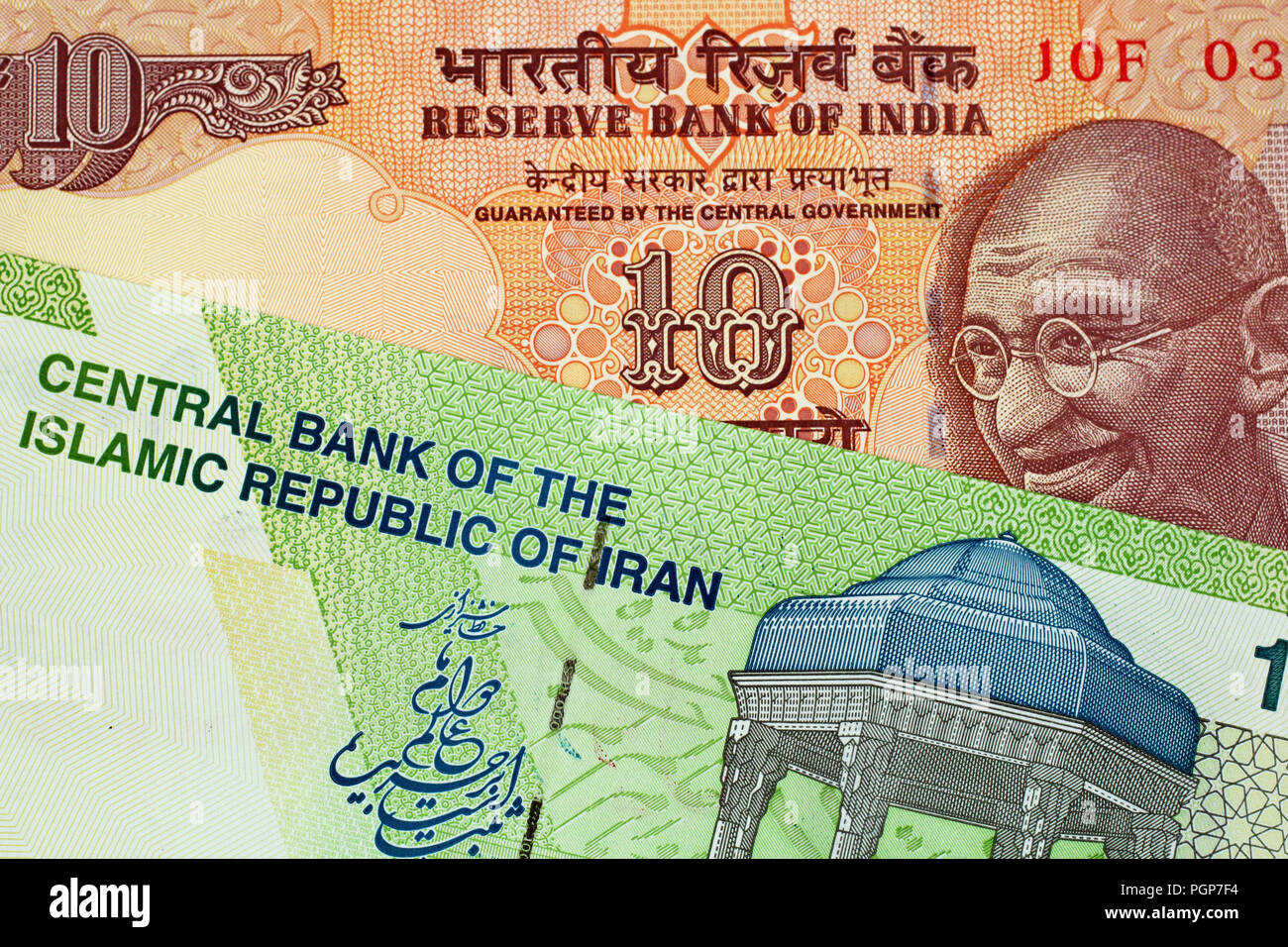 A Close Up Image Of An Indian 10 Rupee Bank Note With An Iranian 10000 Rial Note Stock Photo Alamy