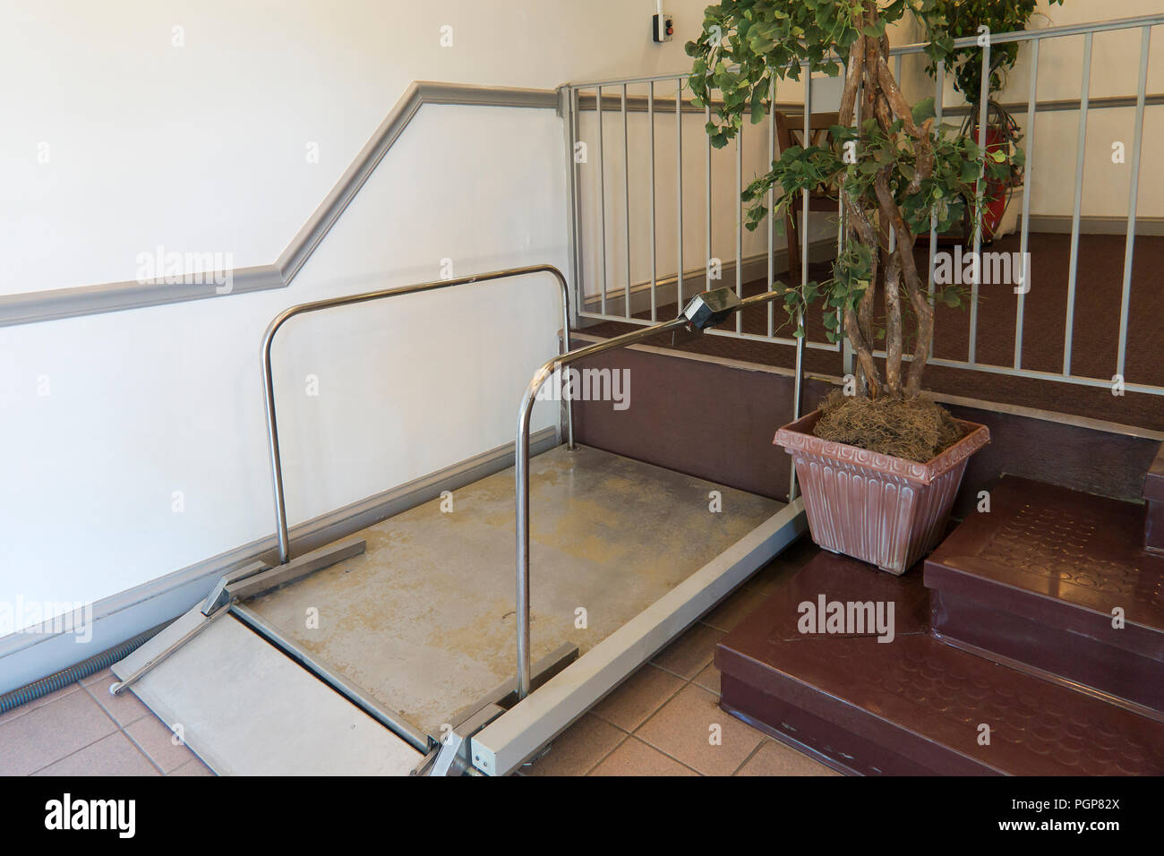 Wheelchair lift in building entrance - USA Stock Photo