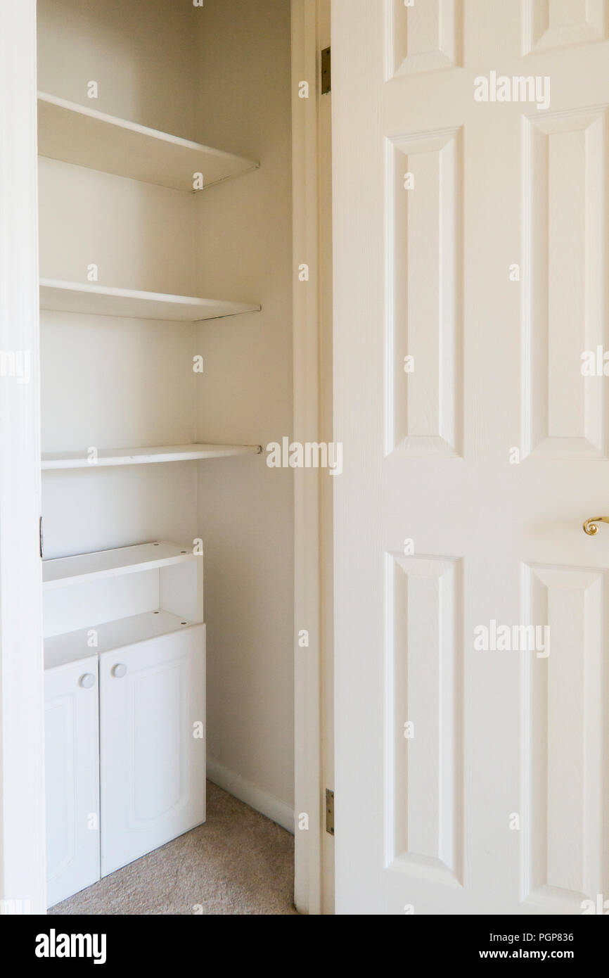 Closet in a small condominium unit painted in white - USA Stock Photo