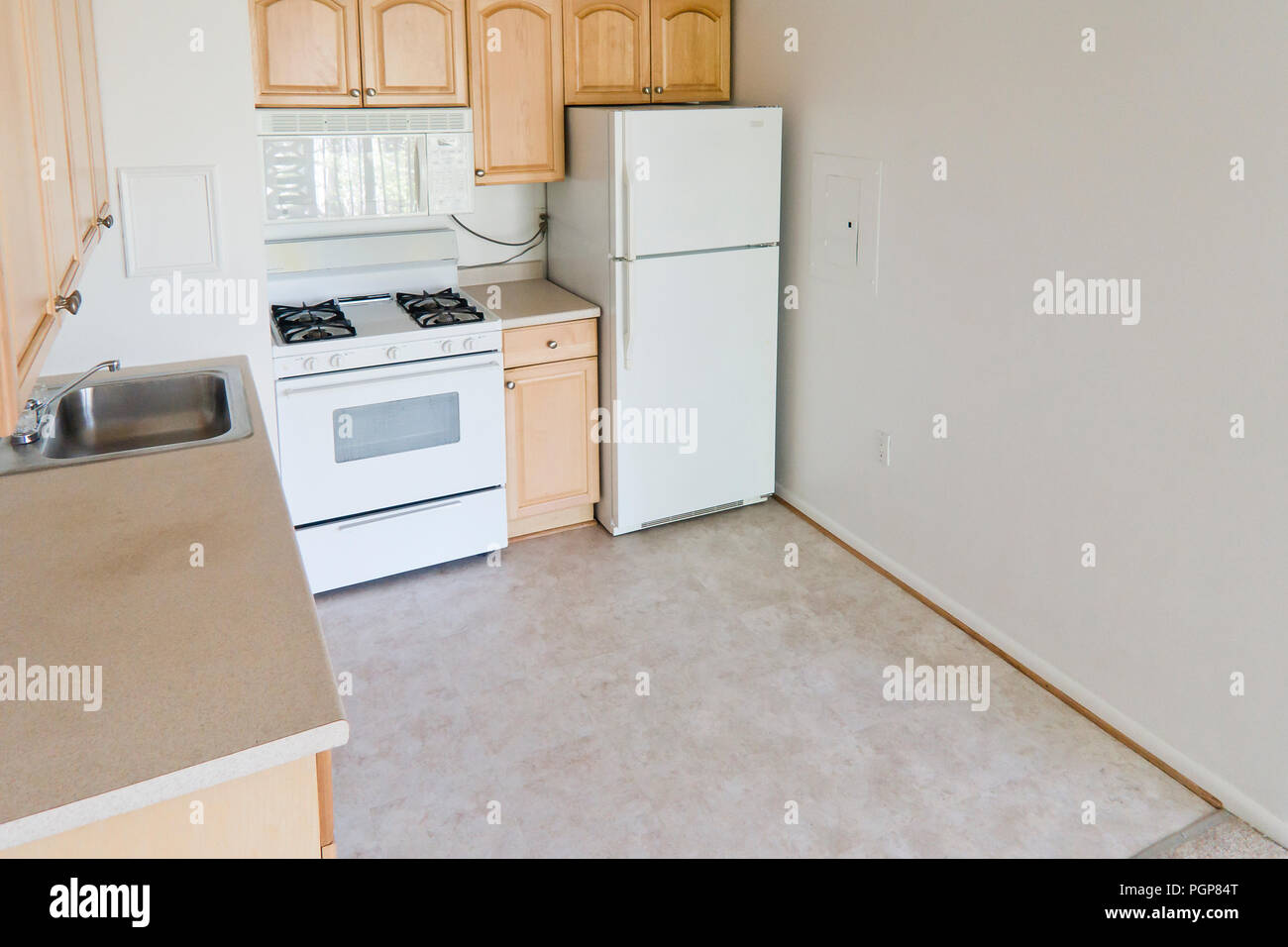 Small modular kitchen in a condominium unit (empty kitchen) USA Stock