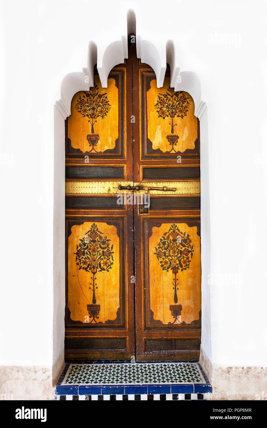 Morocco, Marrakesh, beautiful antique door close up. Gilded panels are decorated with fanciful botanicals. Bahia Palace. Stock Photo