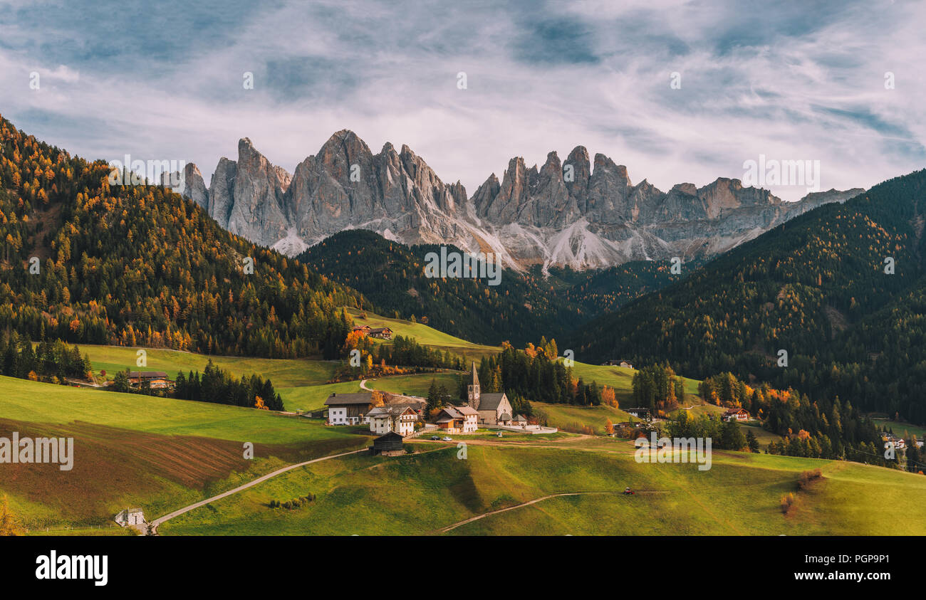 Santa Maddalena (St Magdalena) village with magical Dolomites mountains in background, Val di Funes valley, Trentino Alto Adige region, Italy, Europe Stock Photo