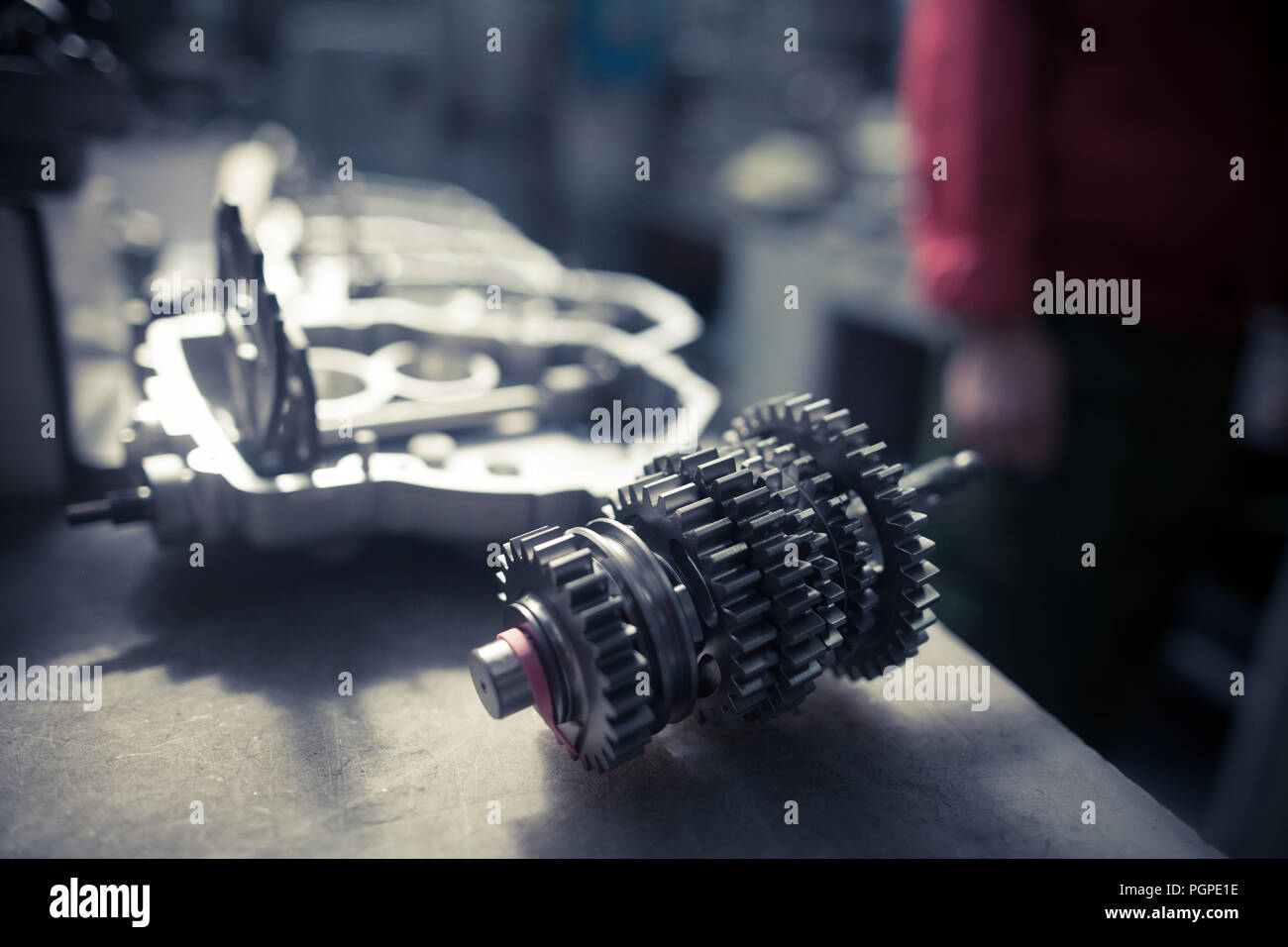 Metal gears from a motorcycle gear box. Stock Photo
