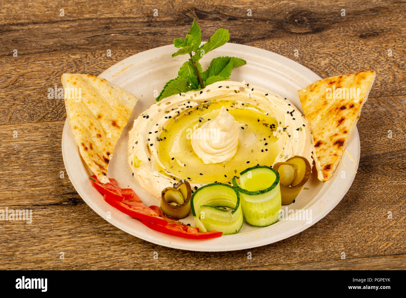 Traditional humus with oil and pita bread Stock Photo - Alamy