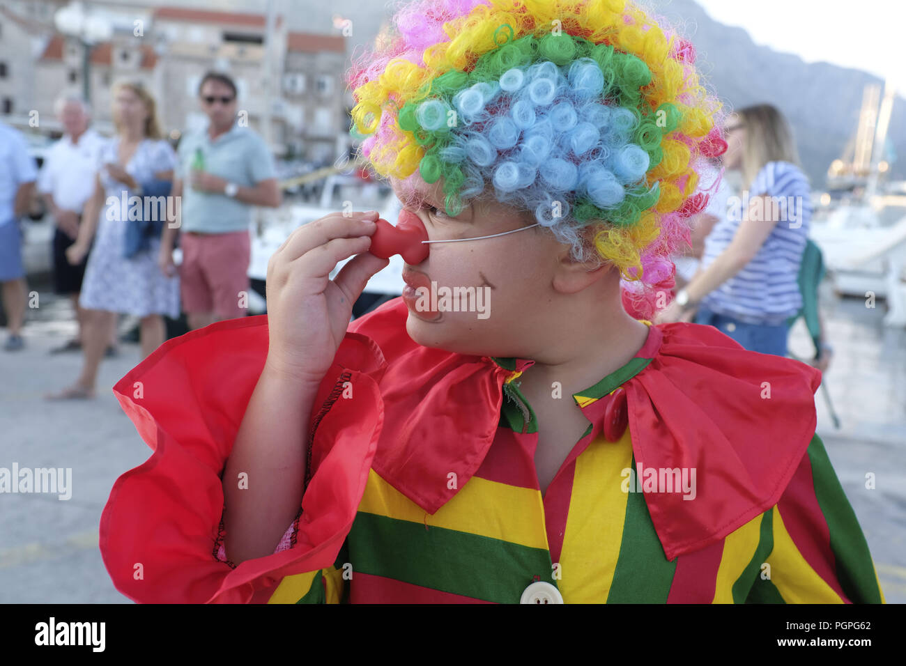 Korcula Croatia. 30th June 2018. A young boy dressed as a clown