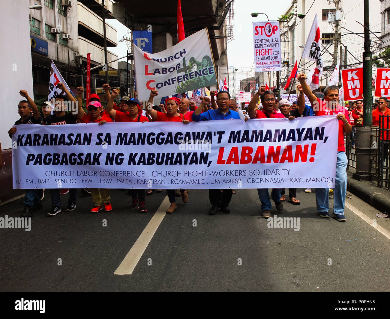 Manila, Philippines. 7th Feb, 2013. Protesters marching along Recto Avenue, going to Mendiola in Manila.Labor Union from different business sectors leads National Heroes' Day march to Mendiola. Labor coalitions will mark National Heroes' Day on Monday by protesting the Duterte administration's alleged failure to address workers' issues. Credit: Josefiel Rivera/SOPA Images/ZUMA Wire/Alamy Live News Stock Photo