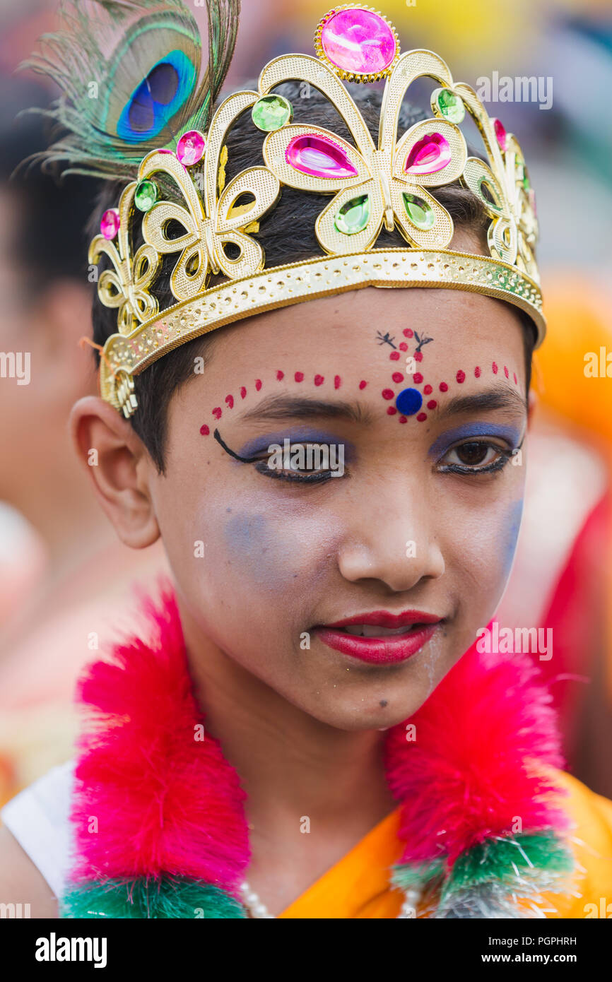 Kathmandu,Nepal - Aug 27,2018: People celebrating Gaijatra Festival.Gai  Jatra, (gāi means cow and jātrā means festival in Nepali, is a festival  celebrated in Nepal, mainly in Kathmandu valley by the Newar community.The