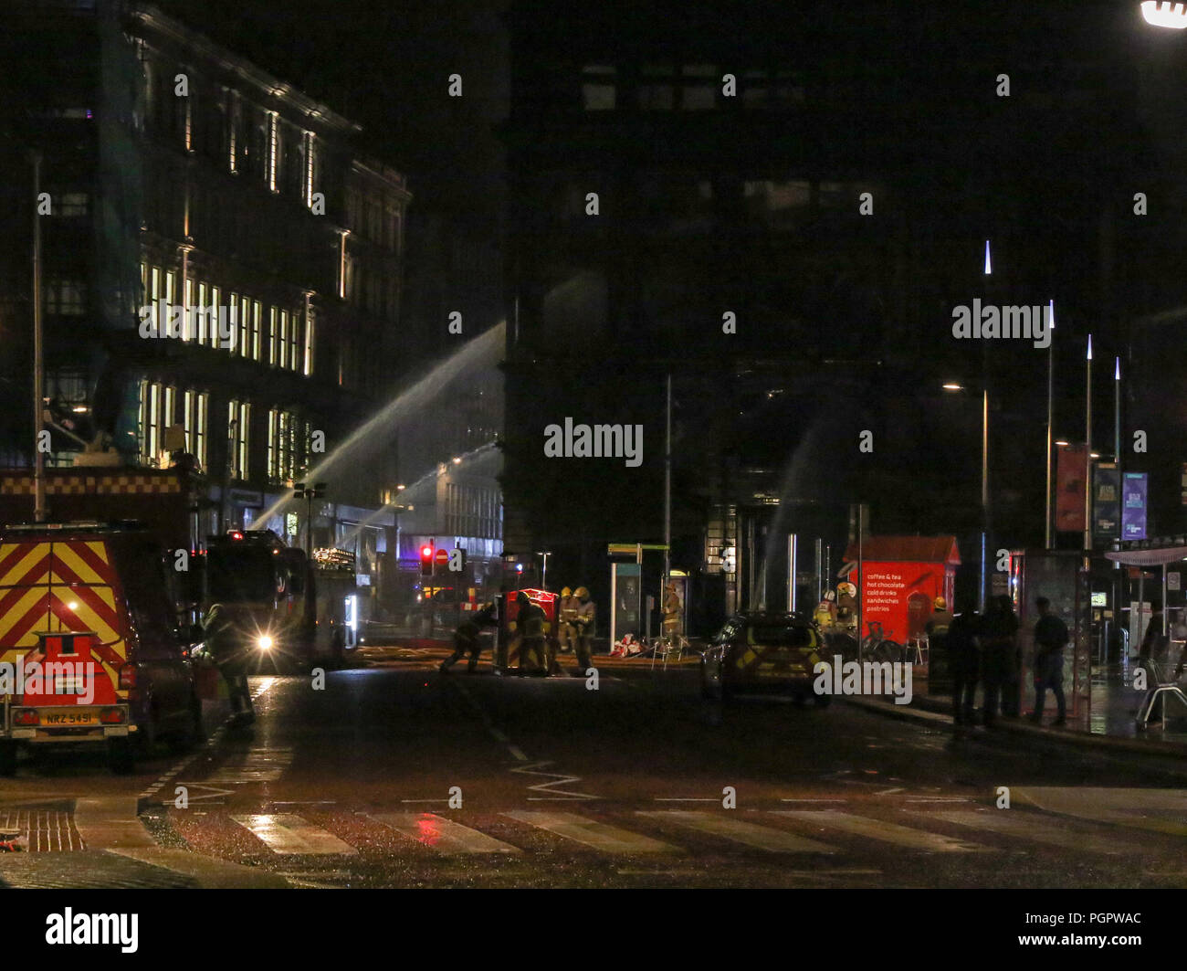 Primark store, Bank Buildings, Belfast, Northern Ireland. 28 August 2018. Belfast has been rocked by the destructive fire that has ravaged the Primark store in Belfast. The building - the Bank Buildings - is a landmark building built in 1785.The store was near the end of a Â£30m renovation/extension when fire broke out around 11 am (BST). Fifteen appliances attended the catastrophic fire with water having to be pumped from the River Lagan (1 km away) to fight the blaze. Credit: David Hunter/Alamy Live News Stock Photo