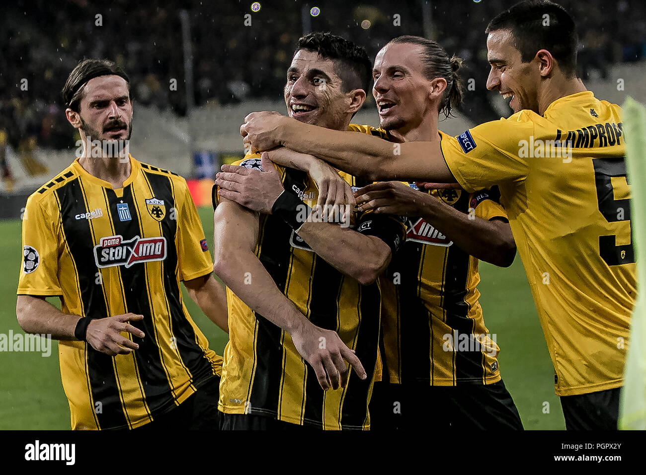 Athens, Greece. 28th Aug, 2018. AEK's Petros Mantalos (2nd L) celebrates  with his teammates during the Champions League Play-Off leg 2 soccer match  between AEK Athens and MOL Vidi FC at Olympic