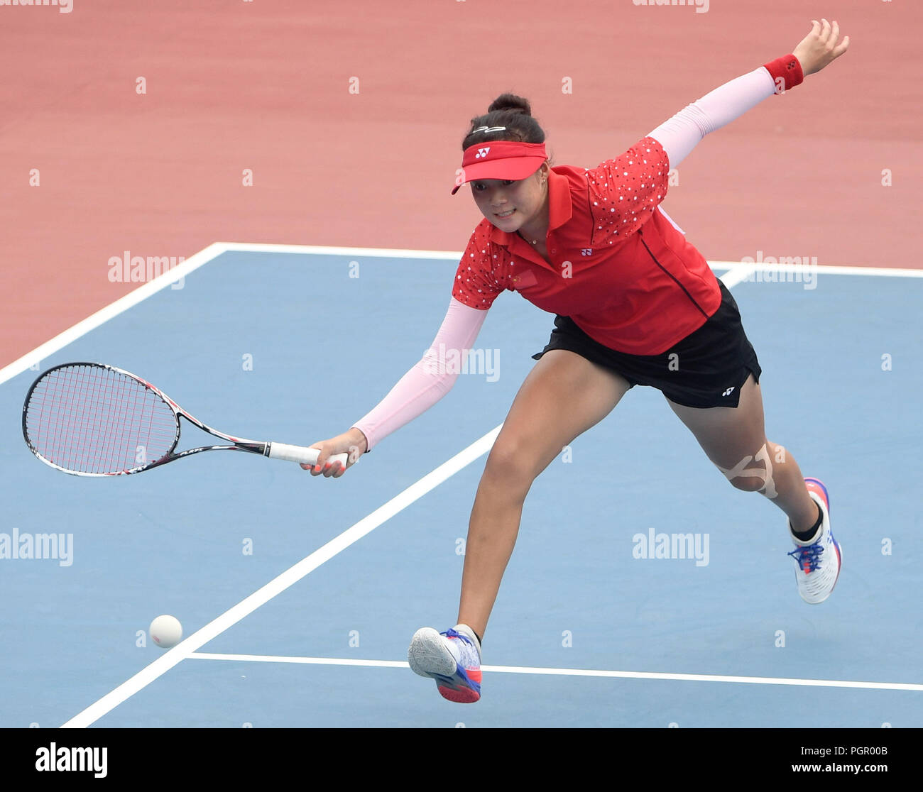 Palembang. 29th Aug, 2018. Yu Yuanyi of China competes during soft tennis  women's single semifinal at
