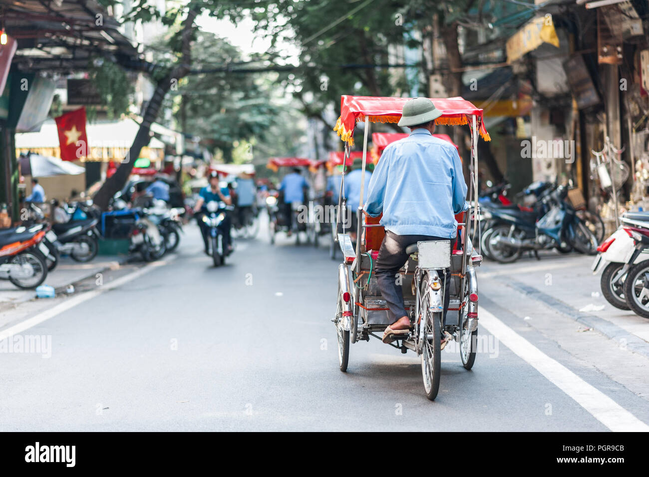 Cyclo in traffic in hanoi hires stock photography and images Alamy