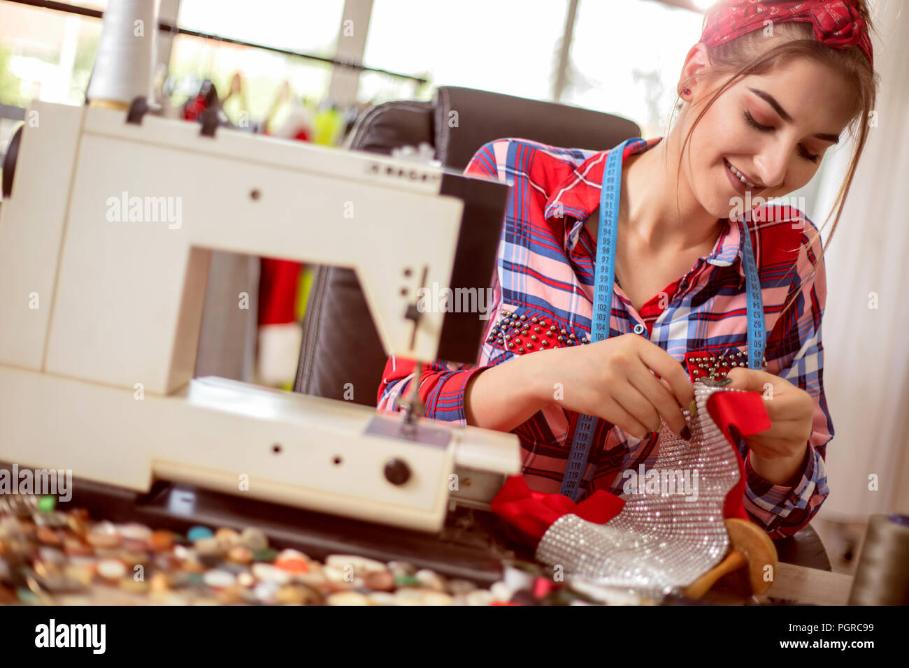 Smiling Tailor Using Sewing Machine High Resolution Stock Photography ...