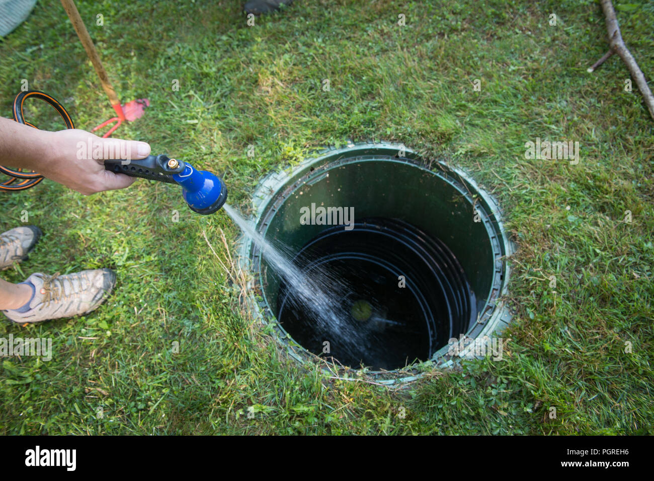 Cleaning and unblocking septic system and draining pipes Stock Photo