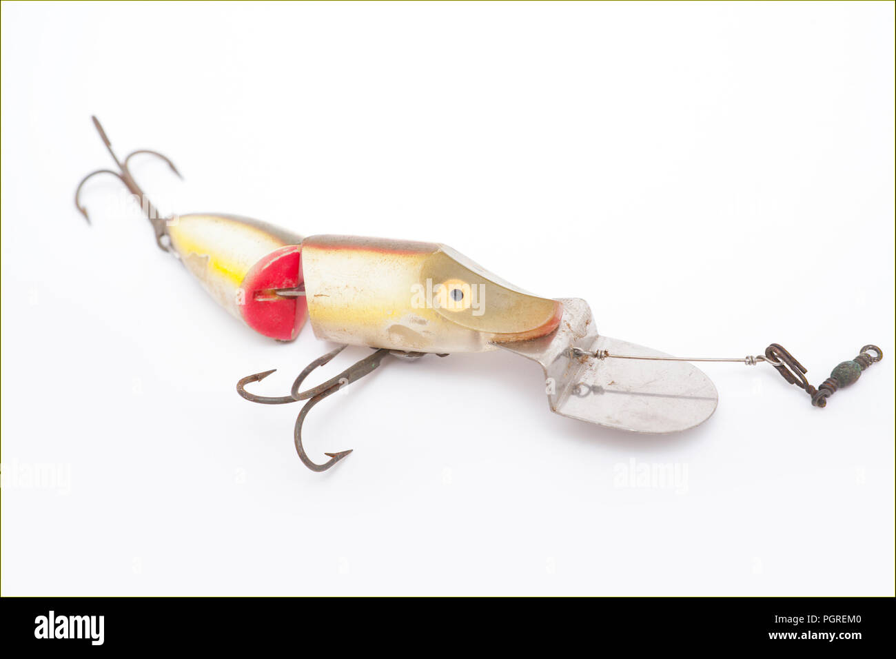 An old Heddon River Runt Spook fishing lure, or plug, designed for catching predatory fish. From a collection of vintage and modern fishing tackle. No Stock Photo
