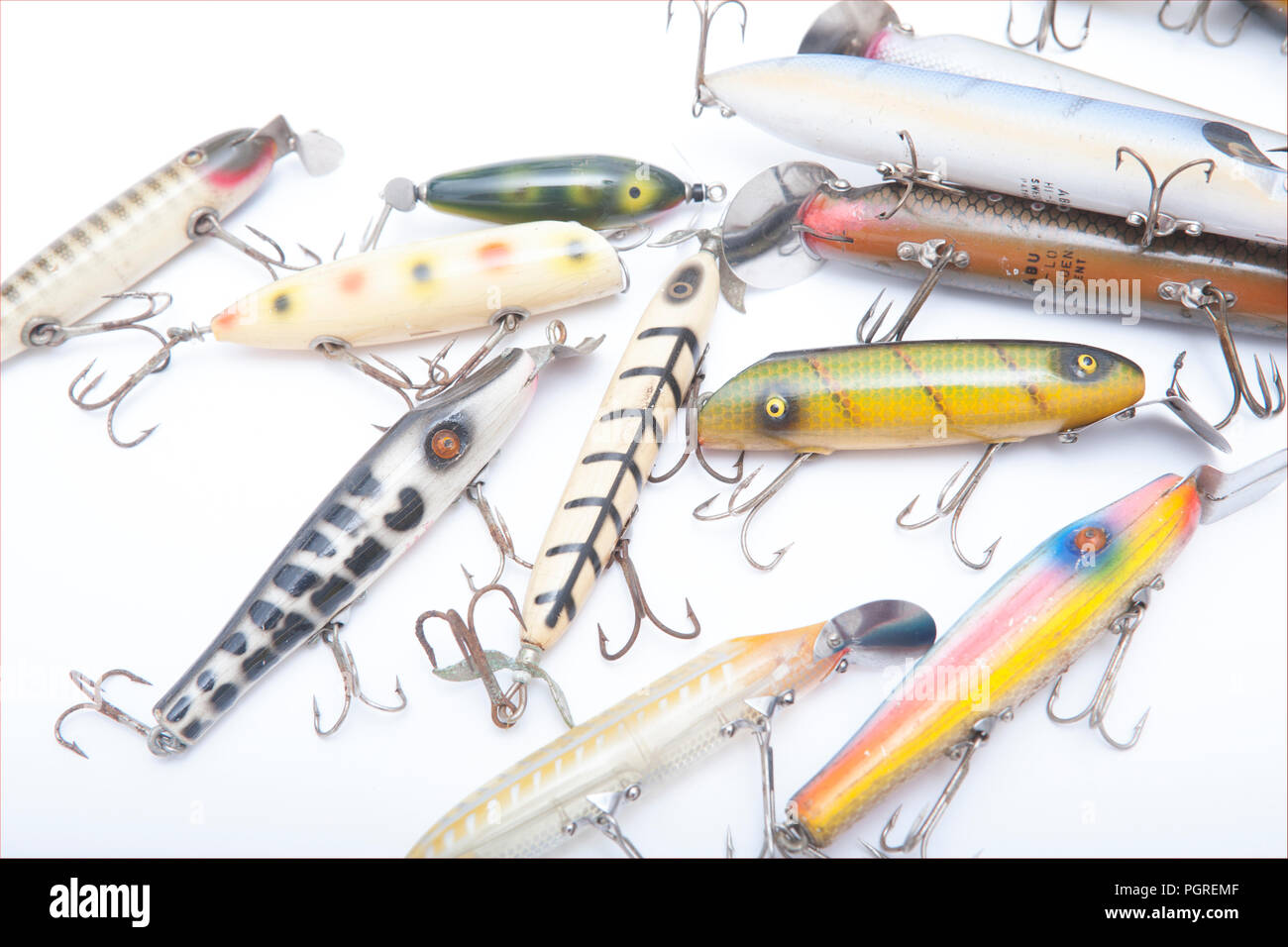 A selection of old fishing lures, or plugs, including makers such as Shakespeare and Abu. and From a collection of vintage and modern fishing tackle.  Stock Photo