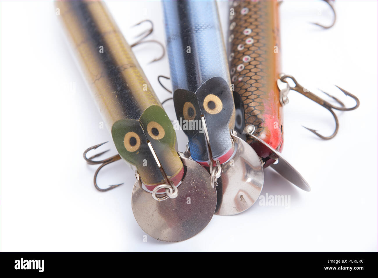 Three Abu Hi-Lo fishing lures, or plugs,with adjustable diving vanes that alter the depth to which the lure dives when it is reeled in. From a collect Stock Photo