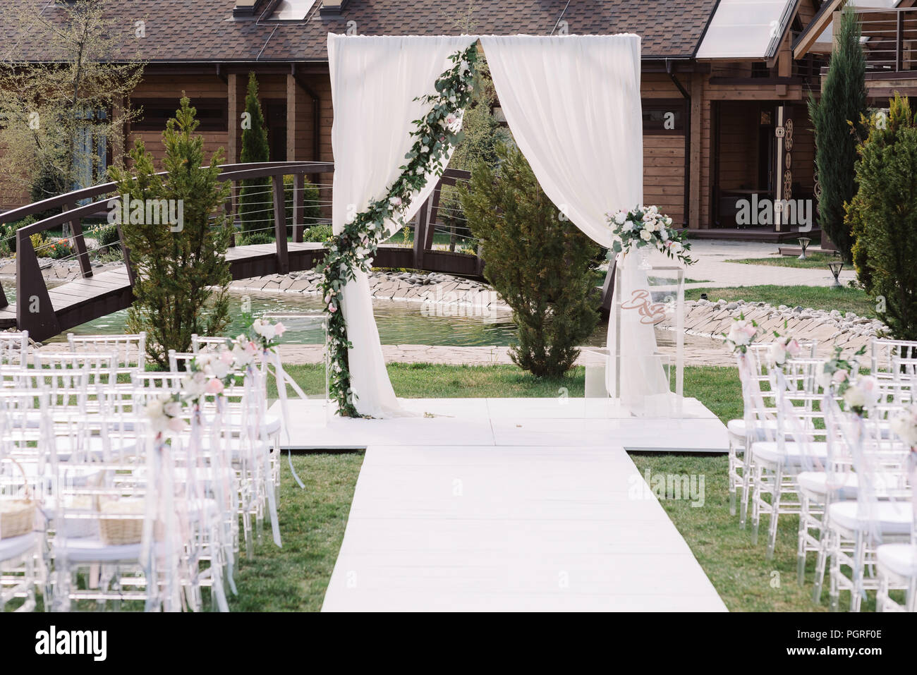 Beautiful wedding ceremony outdoors on the grass Stock Photo