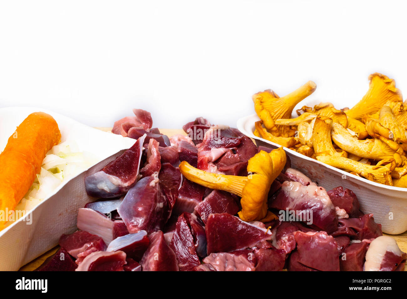 Bird chicken or turkey giblets gizzards stomachs . Raw uncooked chicken