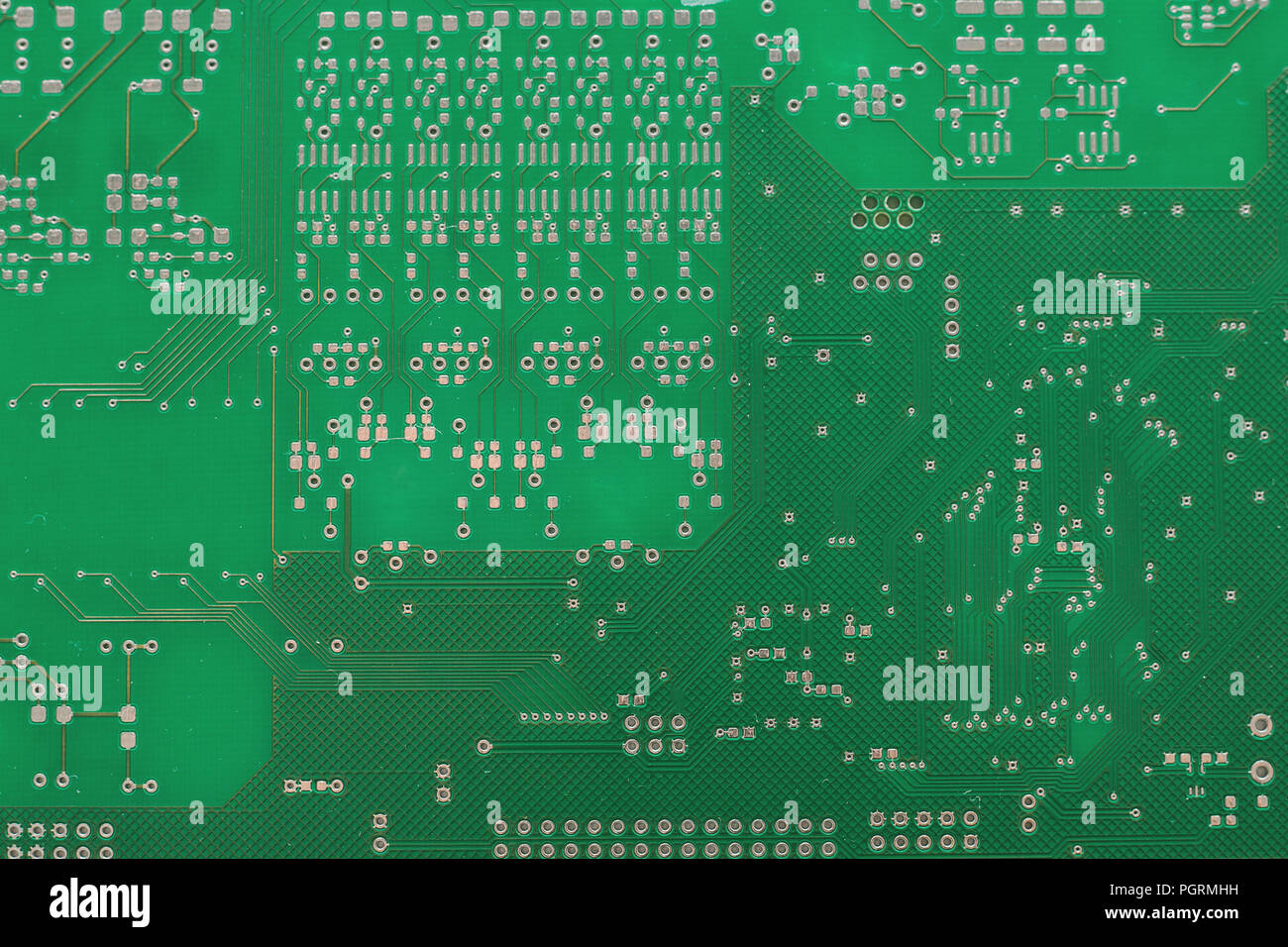 A Green Computer Circuit Board Background With Microcircuits Stock