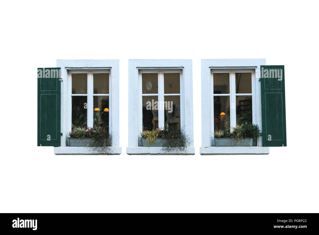Set of old wooden exterior windows on a white background. Stock Photo