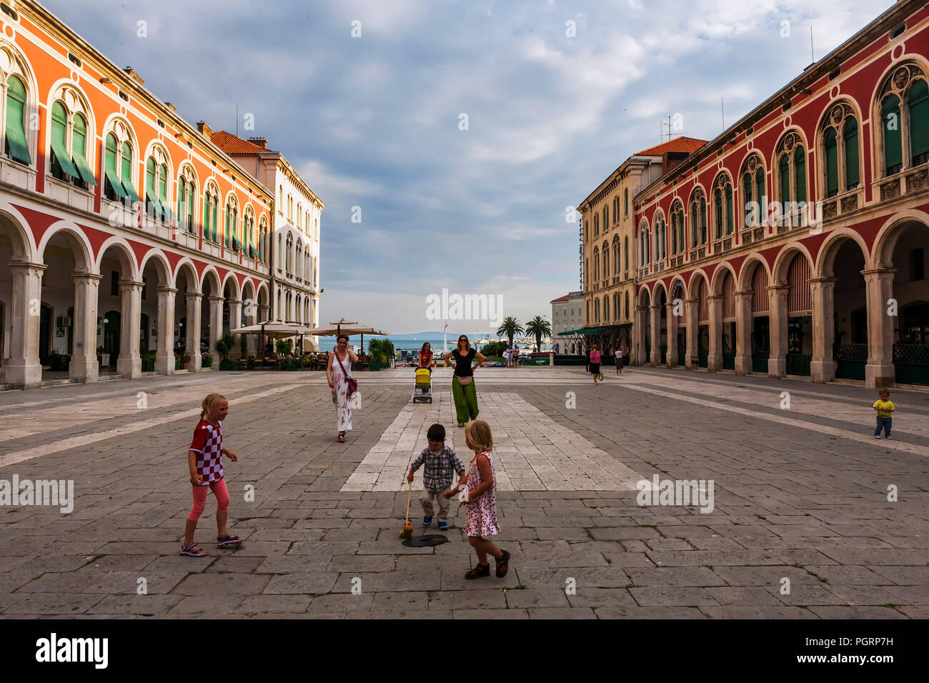 Children play in the grand Trg Republike, popularly known as Prokurative, Split, Croatia Stock Photo